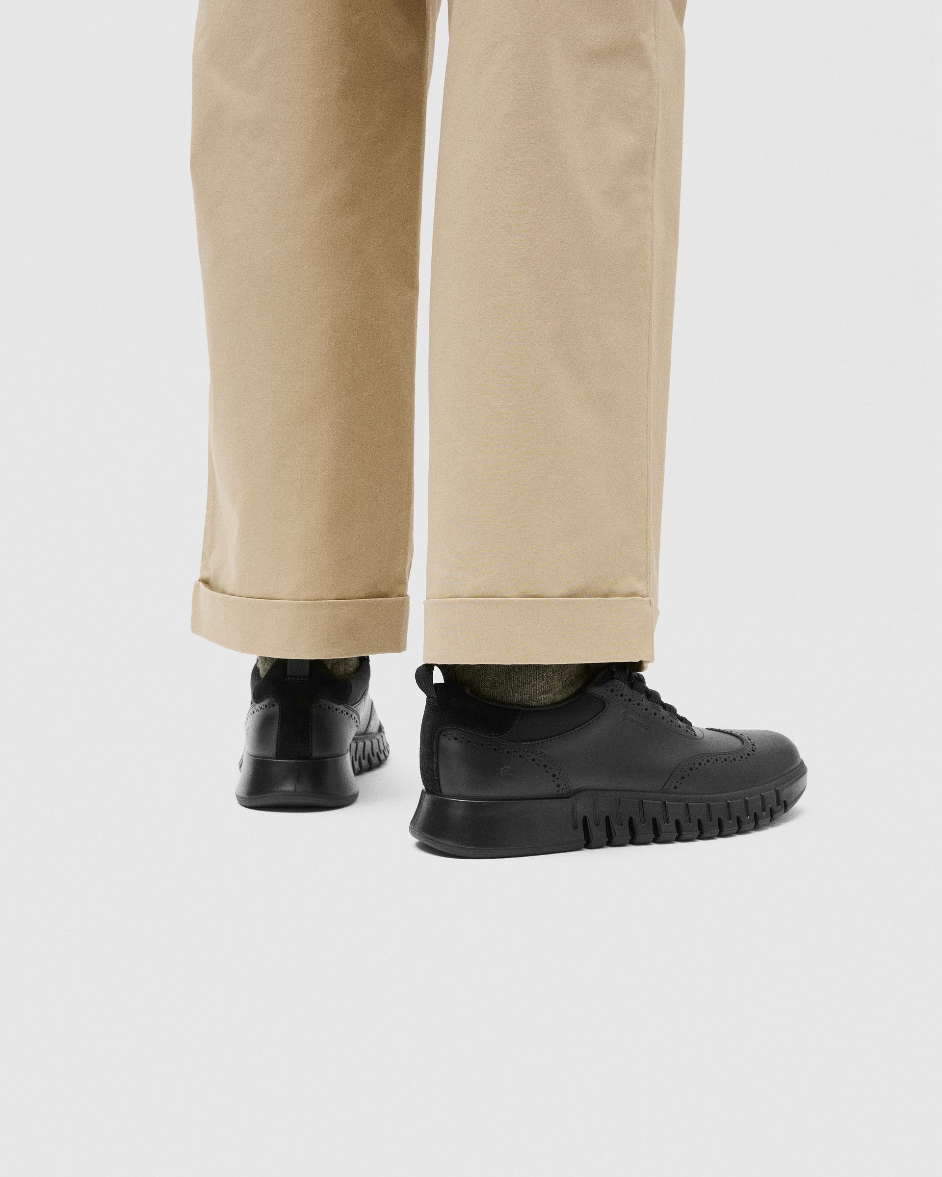 Men's ECCO® Gruuv Studio Leather Gore-Tex Hybrid Wingtip Derby Sneaker - Black - Lifestyle image-1