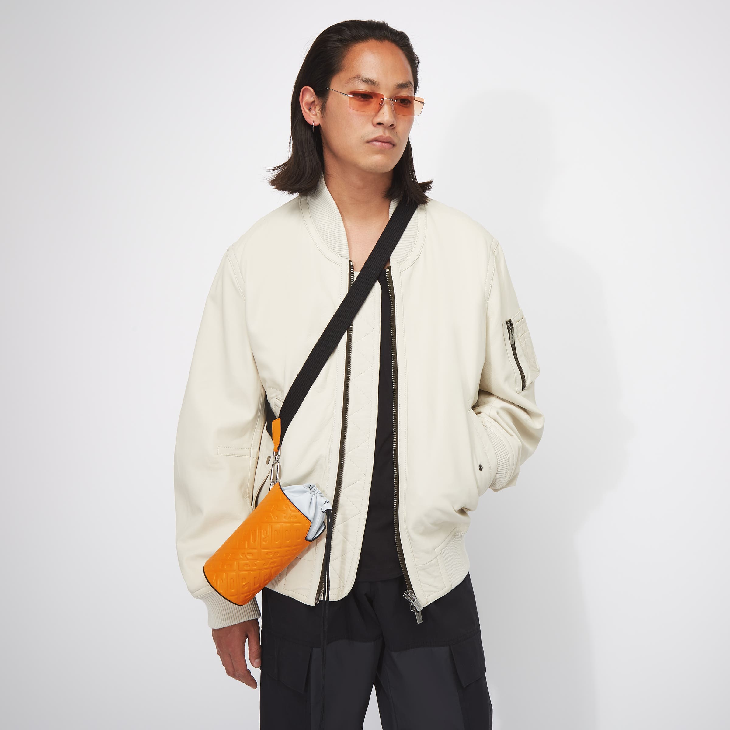 ECCO® E Pot Sling Monogram Leather Crossbody Bag - Orange - Modelshot-1